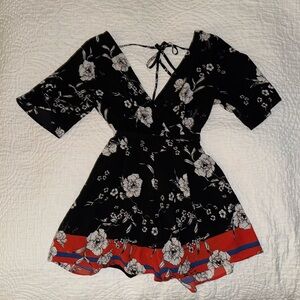 Short romper with open back